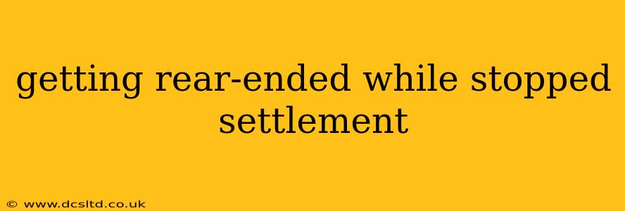 getting rear-ended while stopped settlement
