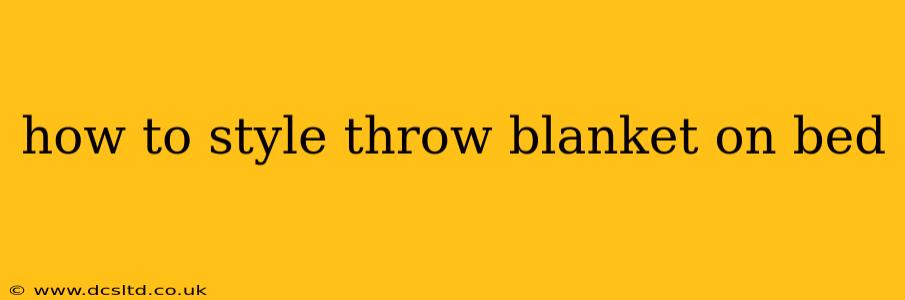 how to style throw blanket on bed