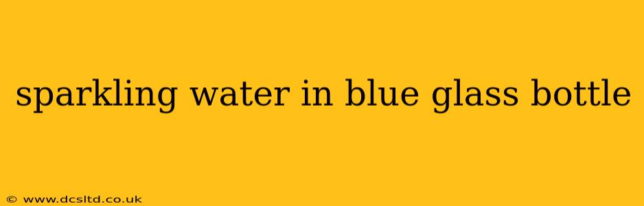 sparkling water in blue glass bottle